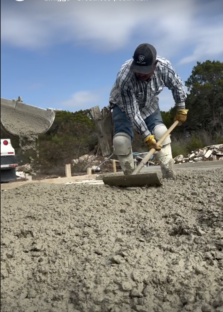 Craftsman hand-finishing fresh concrete